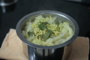 Cooked Tapioca with grated Coconut mix